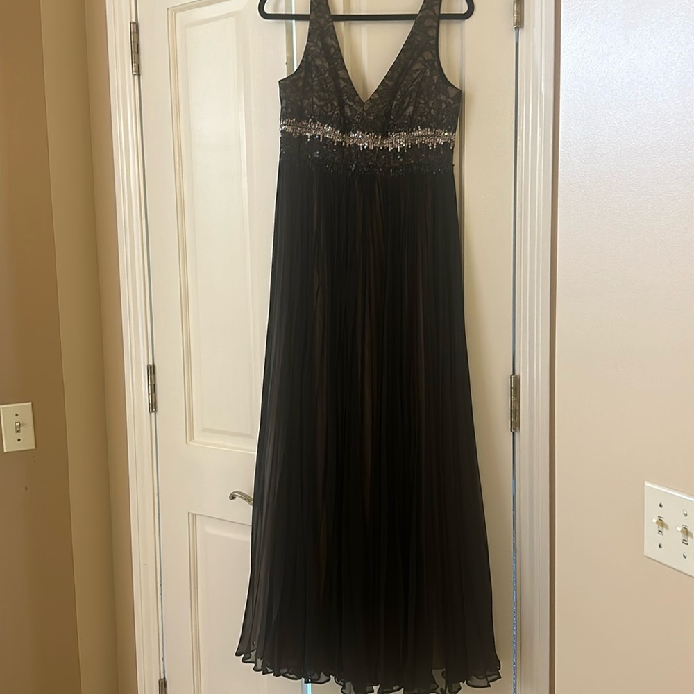 Carmen Marc Valvo collection lace and sequin gown.